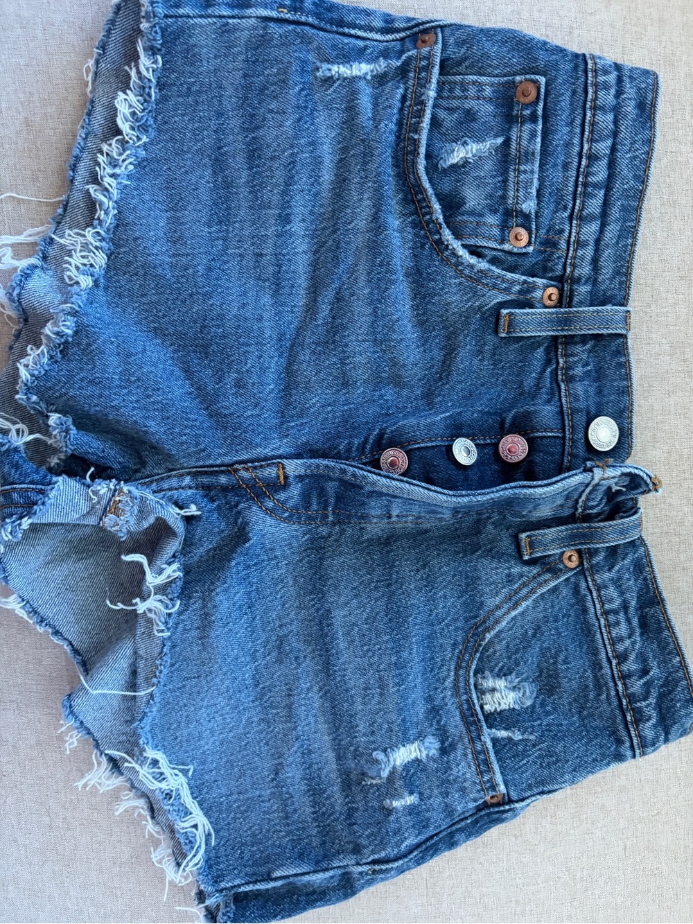 Levi's Distressed Mid-Blue Denim Cutoff Shorts